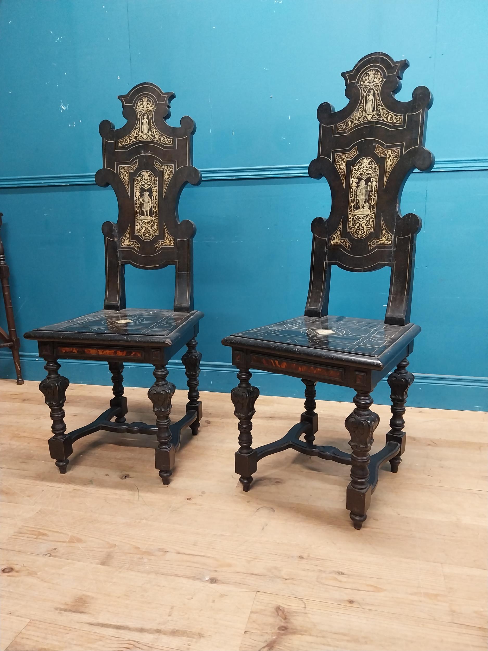 Pair of Aesthetic Movement ebonised hall chairs with inlaid bone decoration of Grecian imagery. {126 - Image 4 of 16