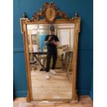 19th C. French gilt mirror with floral decoration surmounted with female mask and bows. {168 cm H