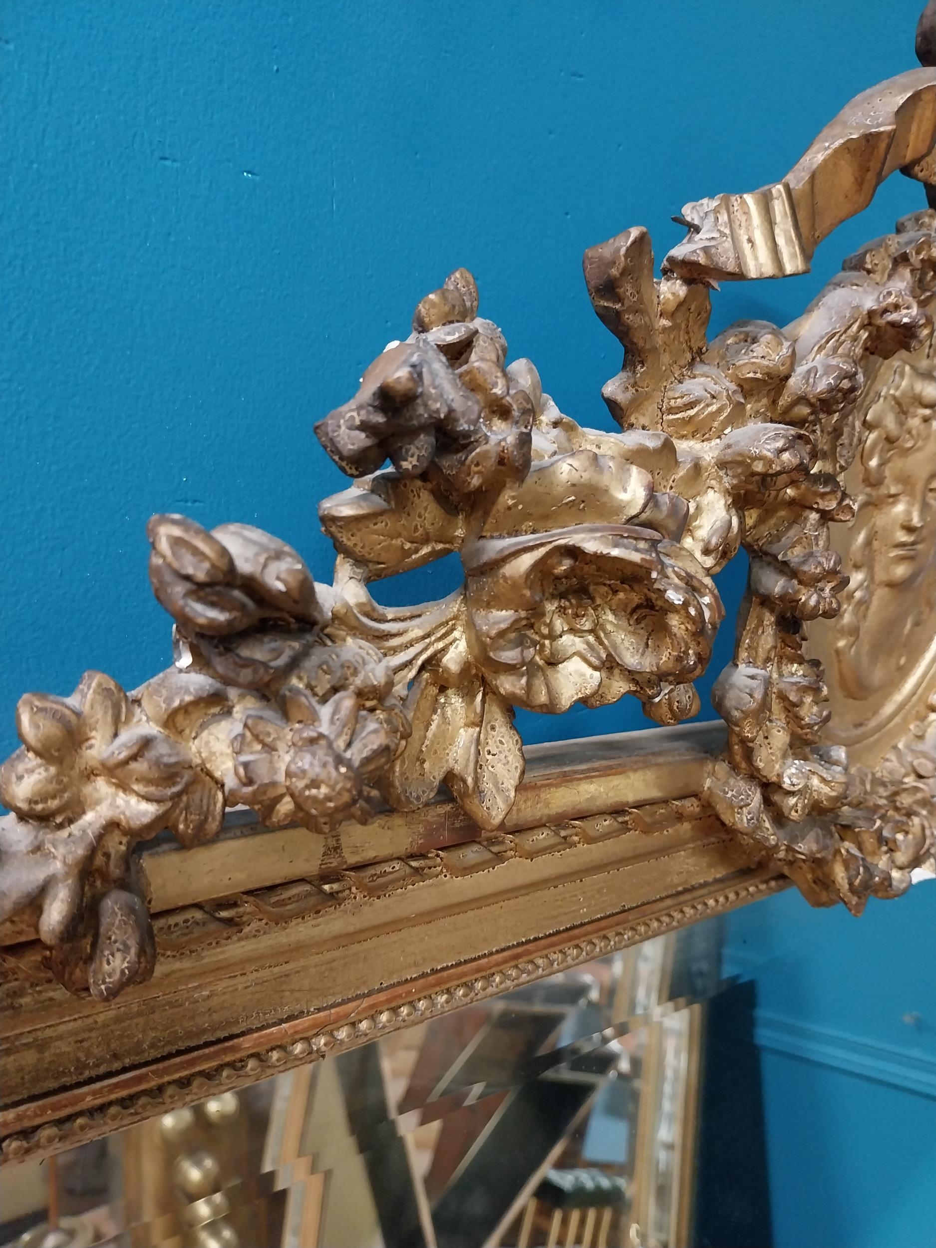 19th C. French gilt mirror with floral decoration surmounted with female mask and bows. {168 cm H - Image 7 of 10