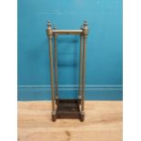 Edwardian brass and cast iron stick stand. {62 cm H x 22 cm W x 22 cm D}.