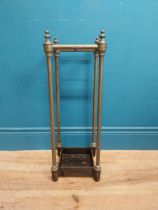 Edwardian brass and cast iron stick stand. {62 cm H x 22 cm W x 22 cm D}.