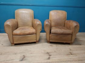 Pair of early 20th C. French leather club chairs {82 cm H x 87 cm W x 87 cm D}.