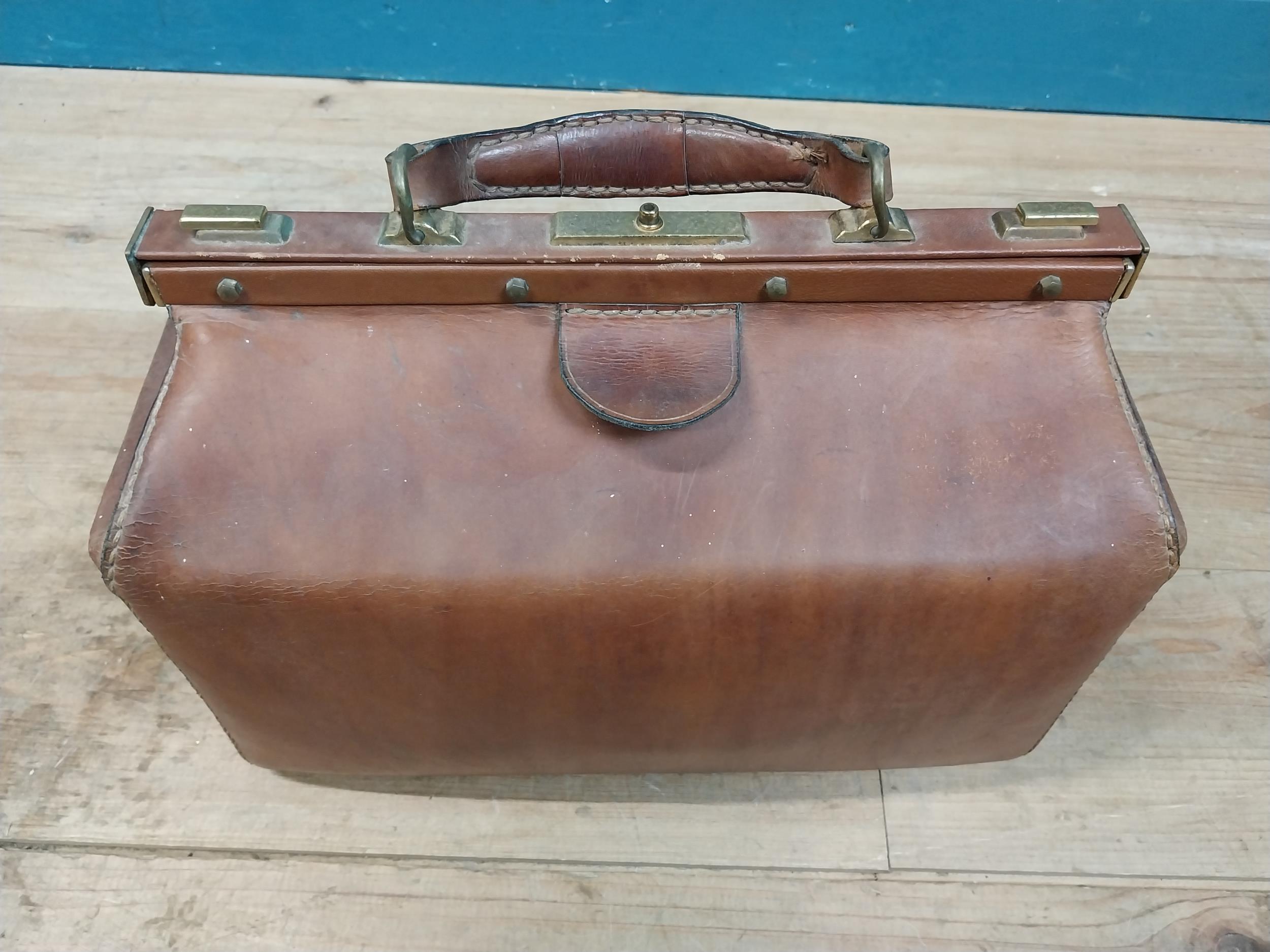 Early 20th C. leather Gladstone bag with metal mounts stamped Marque Deposee. {36 cm H x 41 cm W x - Image 5 of 7