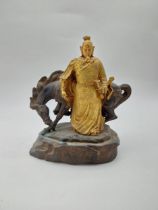 Oriental bronze model of horse and warrior. {28 cm H x 26 cm W x 16 cm D}.