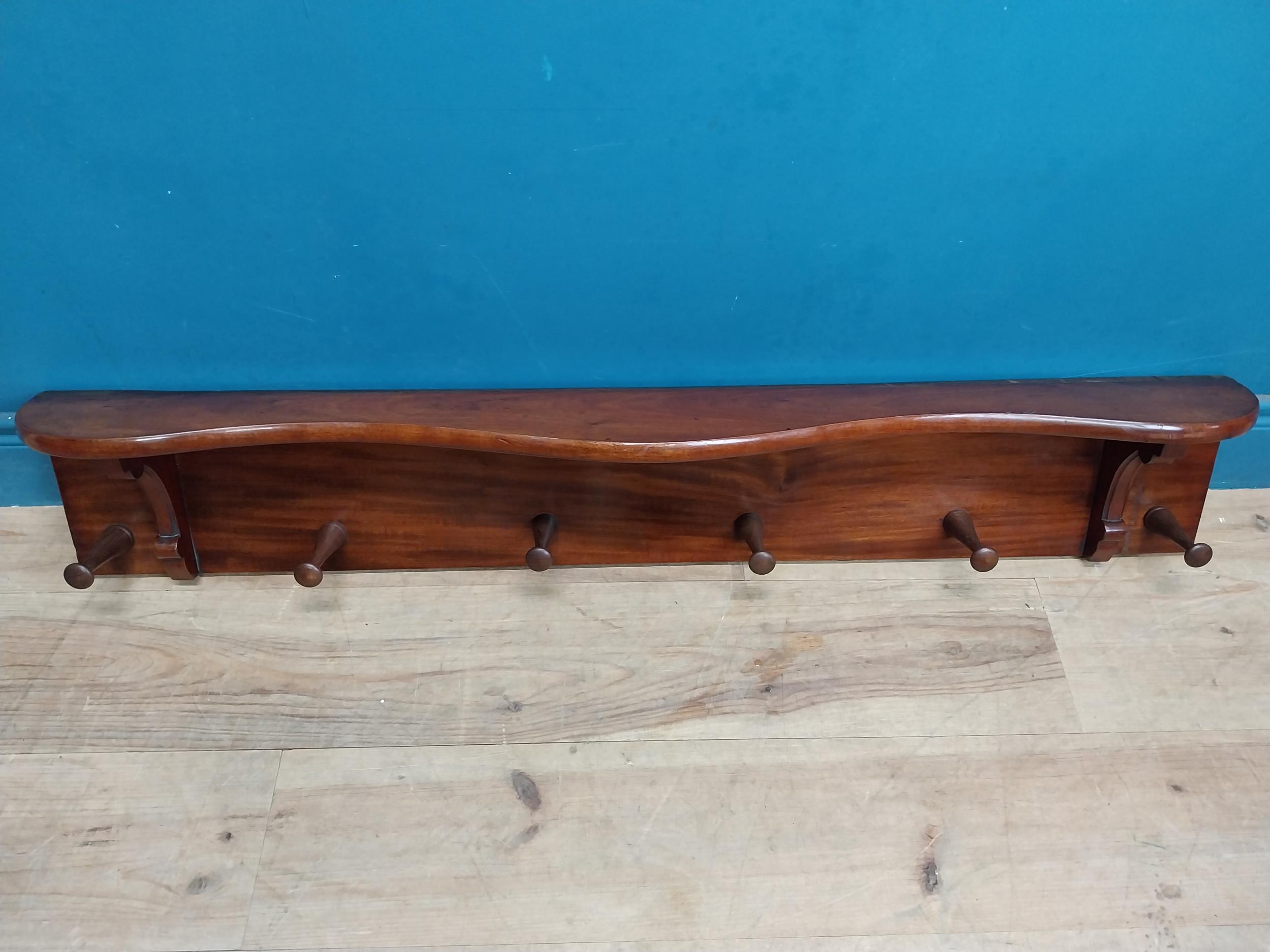 19th C. mahogany wall hanging coat rack. {20 cm H x 123 cm W x 17 cm D}.