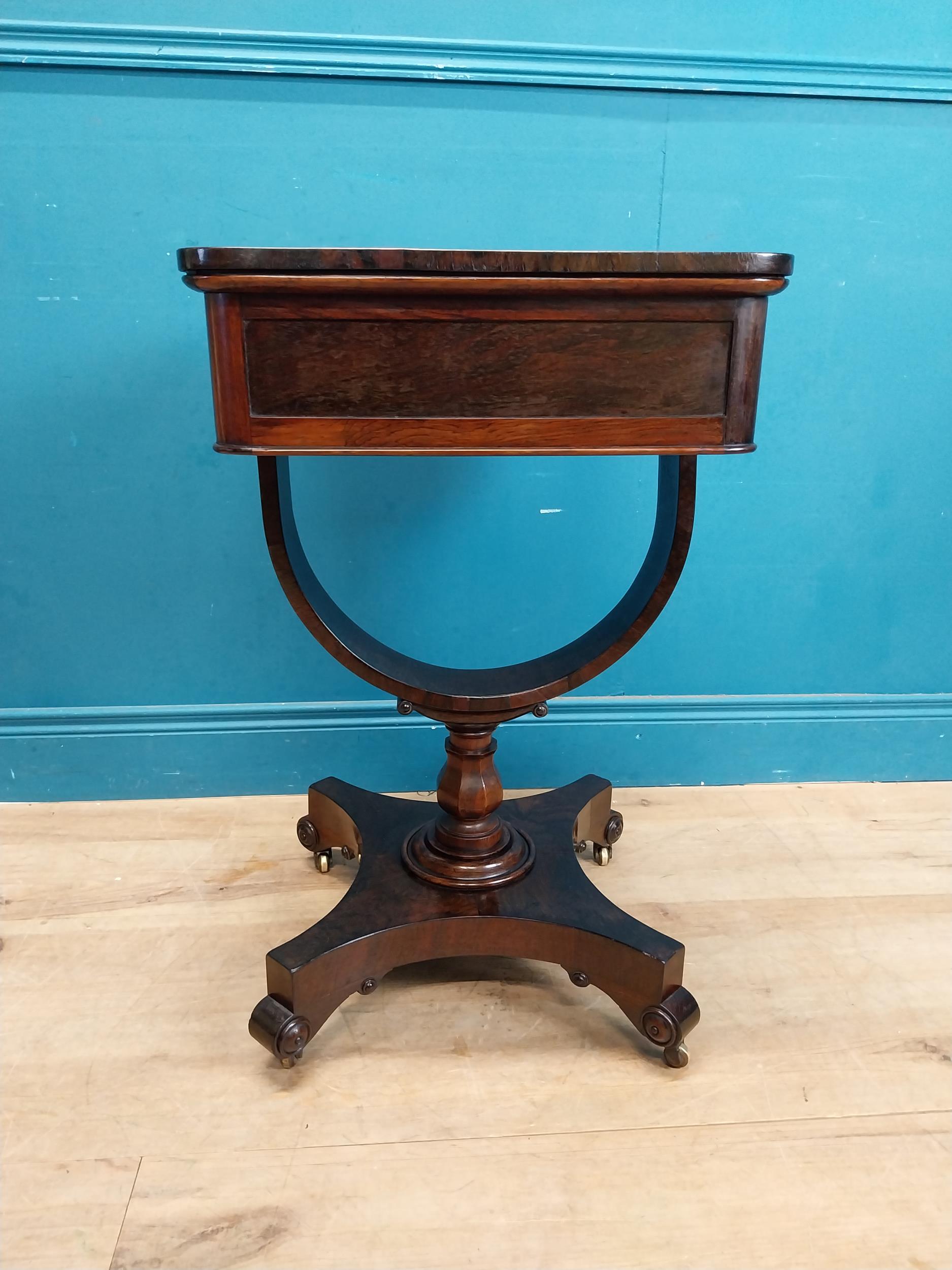 William IV rosewood lamp table with single drawer in frieze raised on bow shaped support on platform - Image 8 of 8