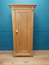 Stripped pine single door kitchen cupboard with six graduated inner shelves. {188 cm H x 88 cm W x