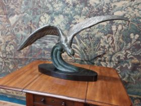 Art Deco spelter bird mounted on marble base {42 cm H x 73 cm W x 34 cm D}.