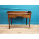 Georgian mahogany side table with gallery back with three short drawers in frieze raised on