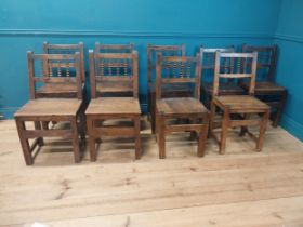 Set of nine early 19th C. oak kitchen chairs raised on square legs {90 cm H x 42 cm W x 42 cm D}.