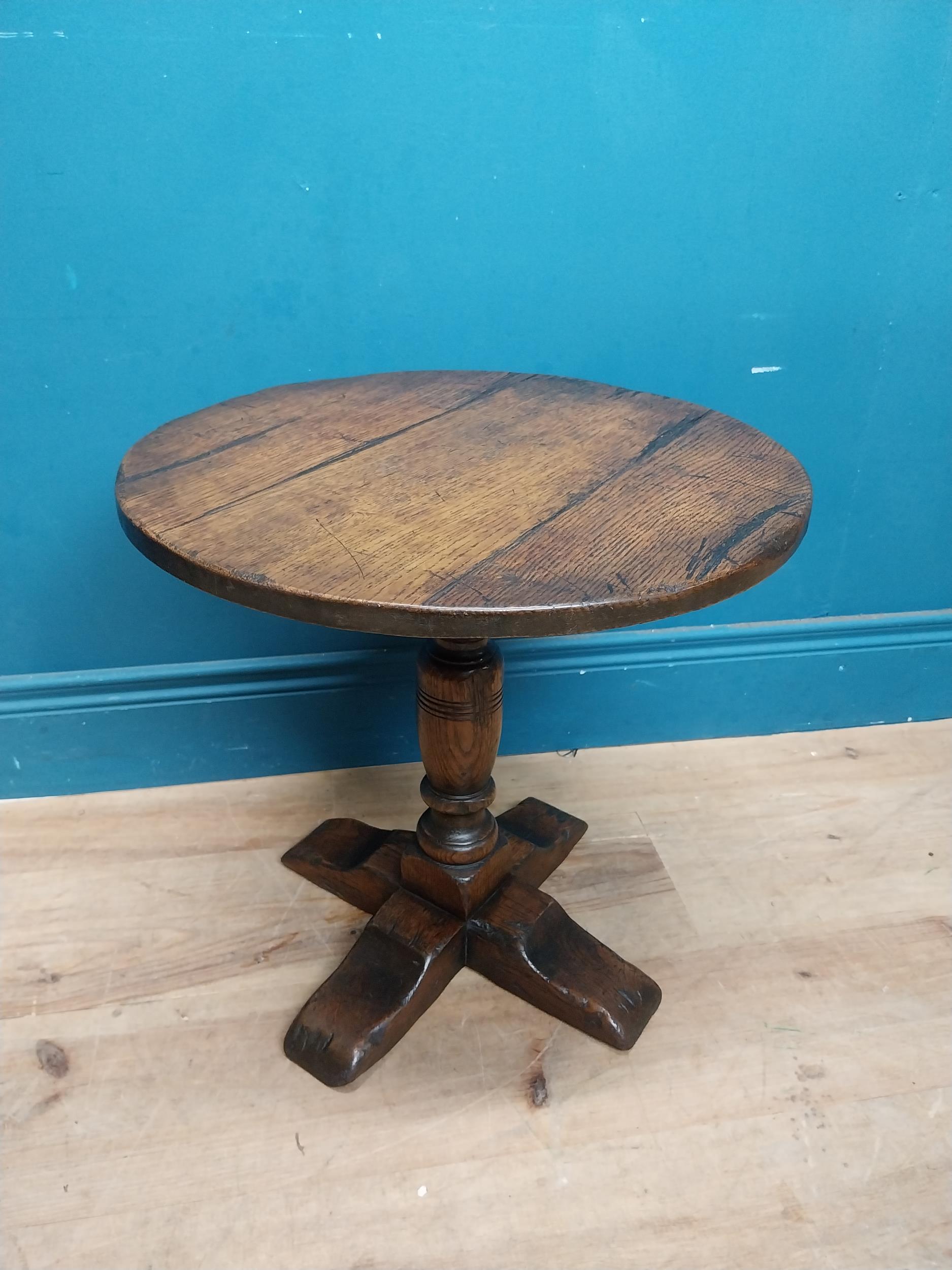 Oak wine table on turned column with four outswept shaped feet. {45 cm H x 45 cm Dia.}. - Image 6 of 6