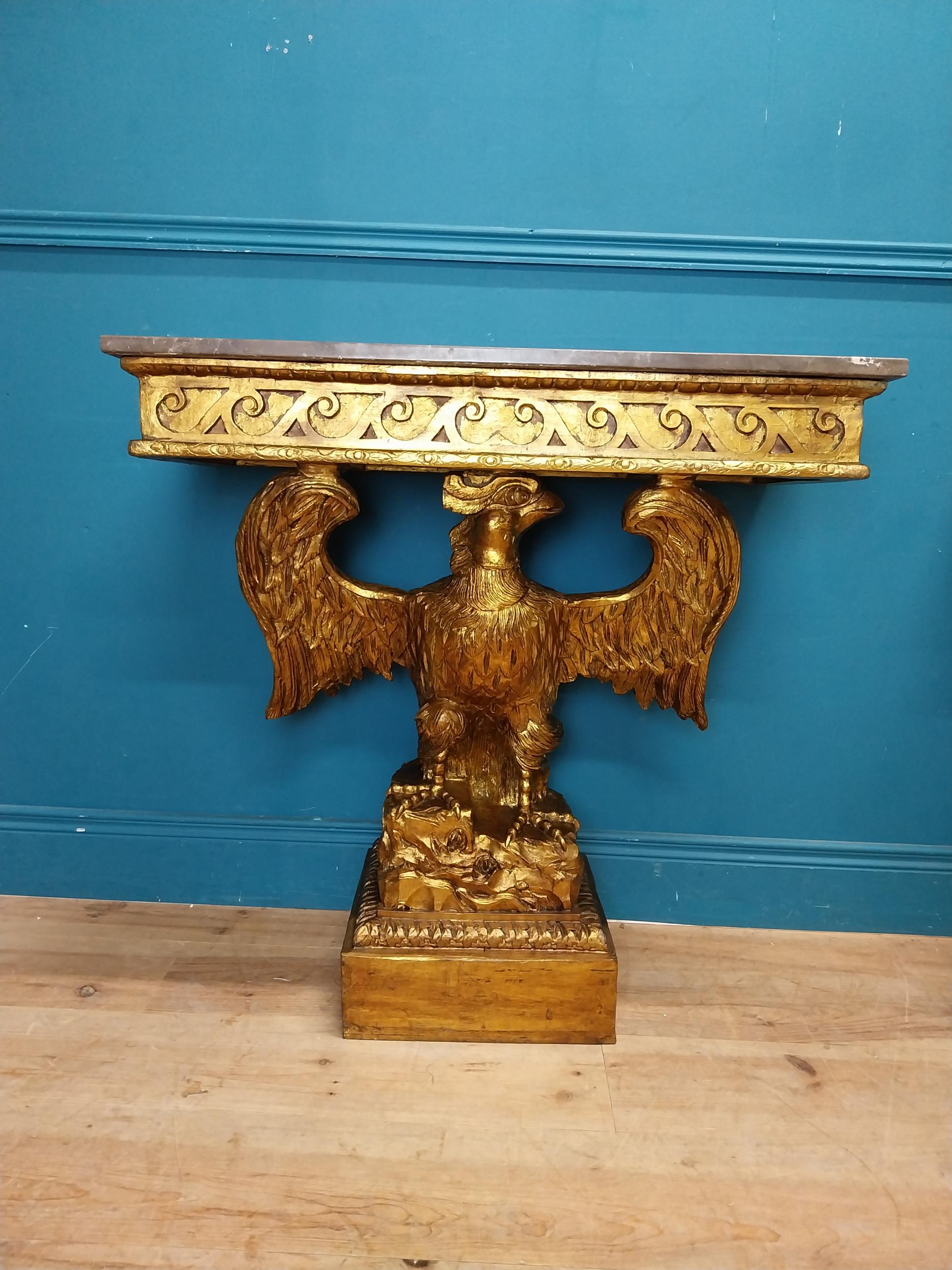 Pair of gilt cast metal marble topped console tables with outspread eagles on base in the William - Image 4 of 8