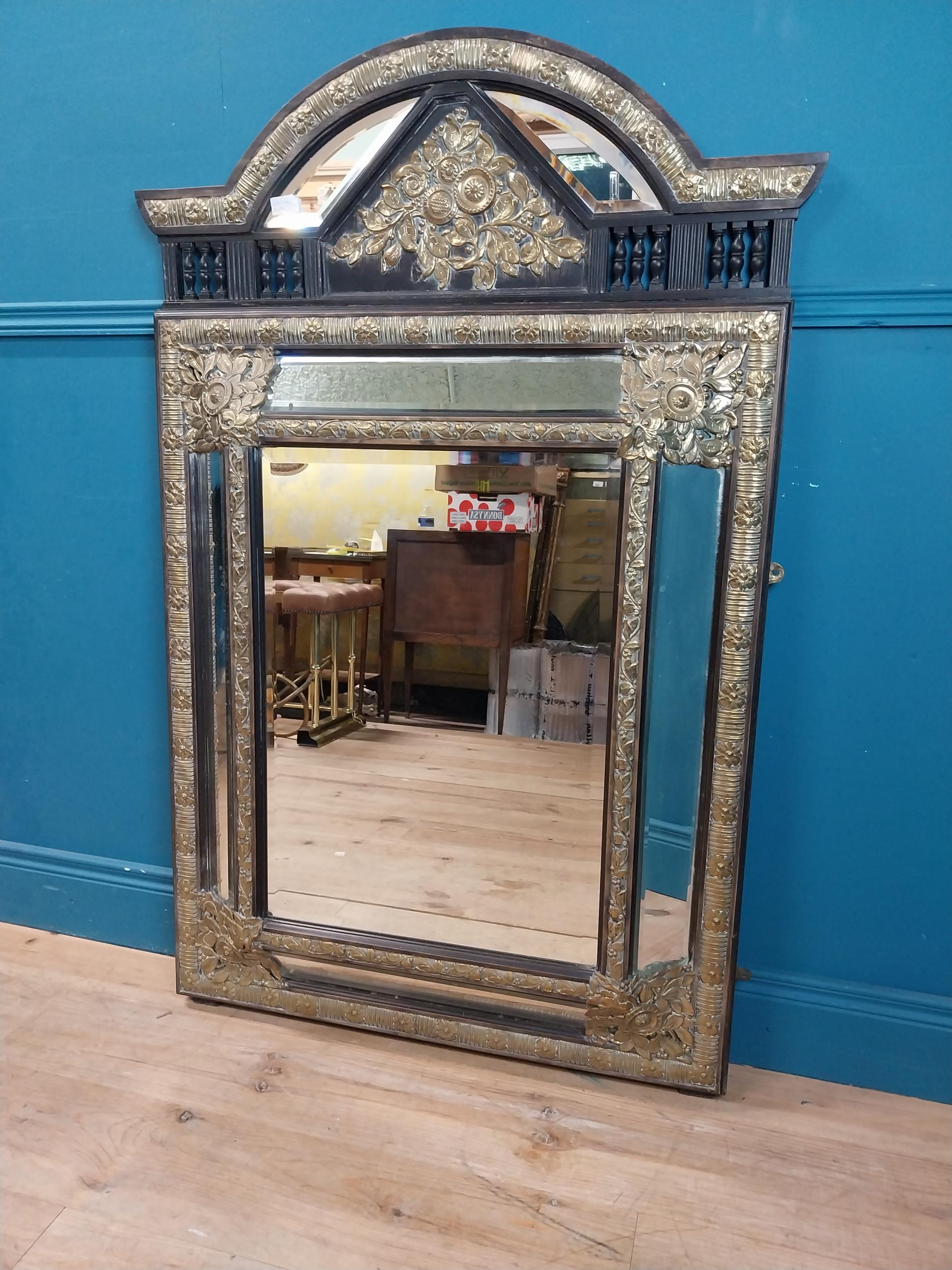 19th C. French brass and ebonised cushion mirror with floral decoration. {131 cm H x 86 cm W}.