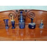 Five pieces of 19th C. blue glass vases and jugs.