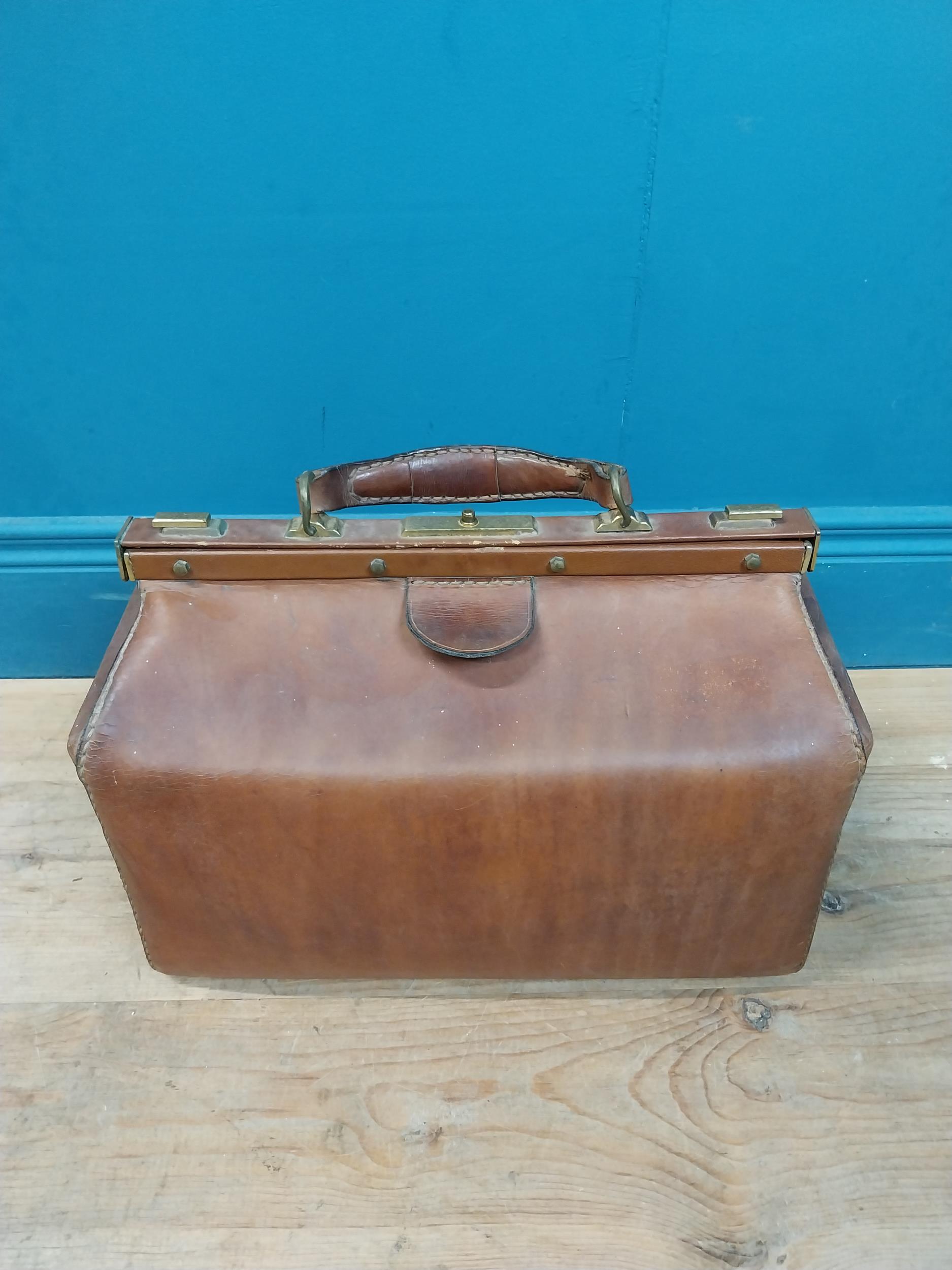 Early 20th C. leather Gladstone bag with metal mounts stamped Marque Deposee. {36 cm H x 41 cm W x - Image 2 of 7