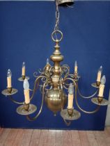 Eight branch bronze chandelier in the colonial style {Hanging H 136cm x Dia 100cm }.
