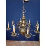 Eight branch bronze chandelier in the colonial style {Hanging H 136cm x Dia 100cm }.