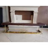 Brass club fender with leather upholstered seat {H 43cm x W 180cm x D 50cm inside W 156cm }.