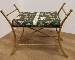 Brass window stool with upholstered seat raised on bamboo style legs {H 52cm x W 63cm x D 32cm }.