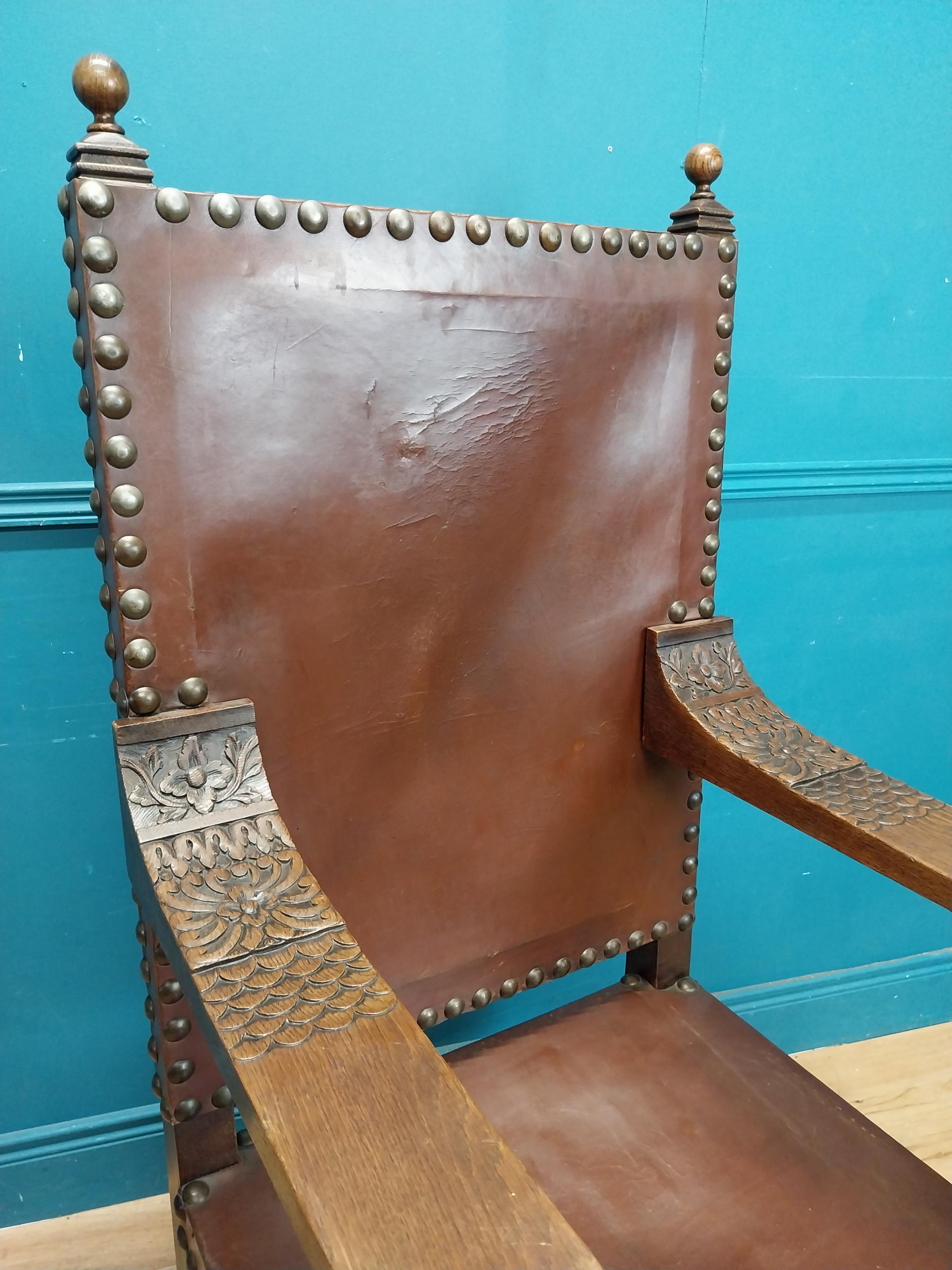 Edwardian carved oak and leather upholstered throne chair. {165 cm H x 63 cm W x 55 cm D}. - Image 8 of 9