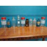 Set of ten early 20th C. glass chemist's jars with original labels.