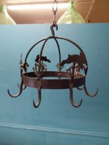 Wrought iron game rack {34 cm H x 40 cm Dia.}.