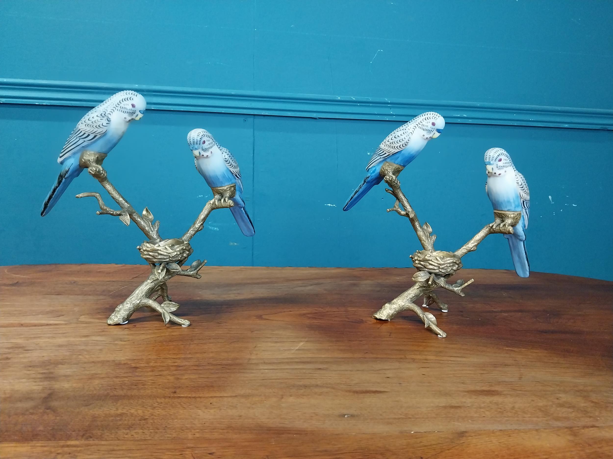 Pair of gilded metal and ceramic bird candle holders {24 cm H x 24 cm W x 12 cm D}.