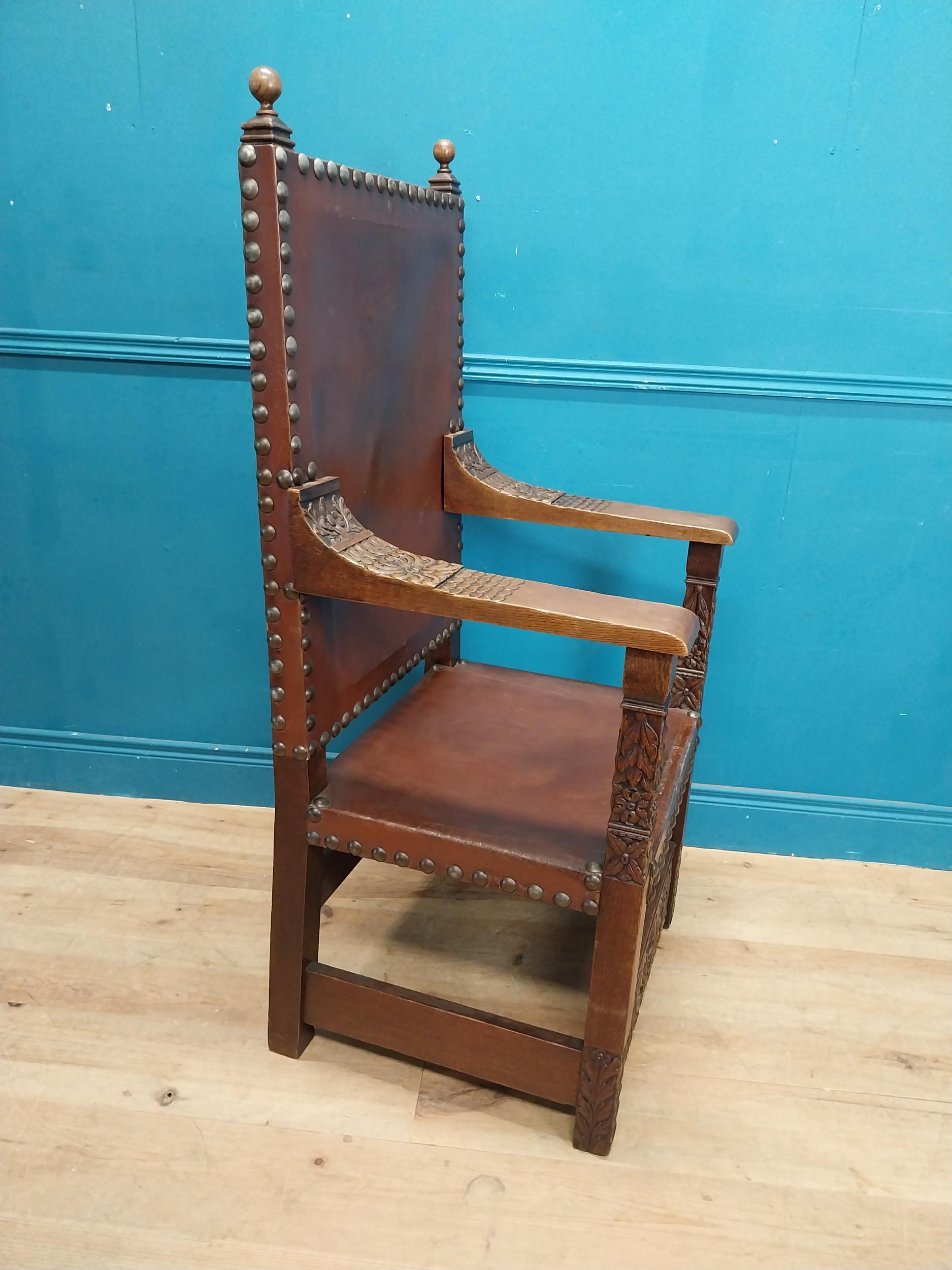 Edwardian carved oak and leather upholstered throne chair. {165 cm H x 63 cm W x 55 cm D}. - Image 6 of 9