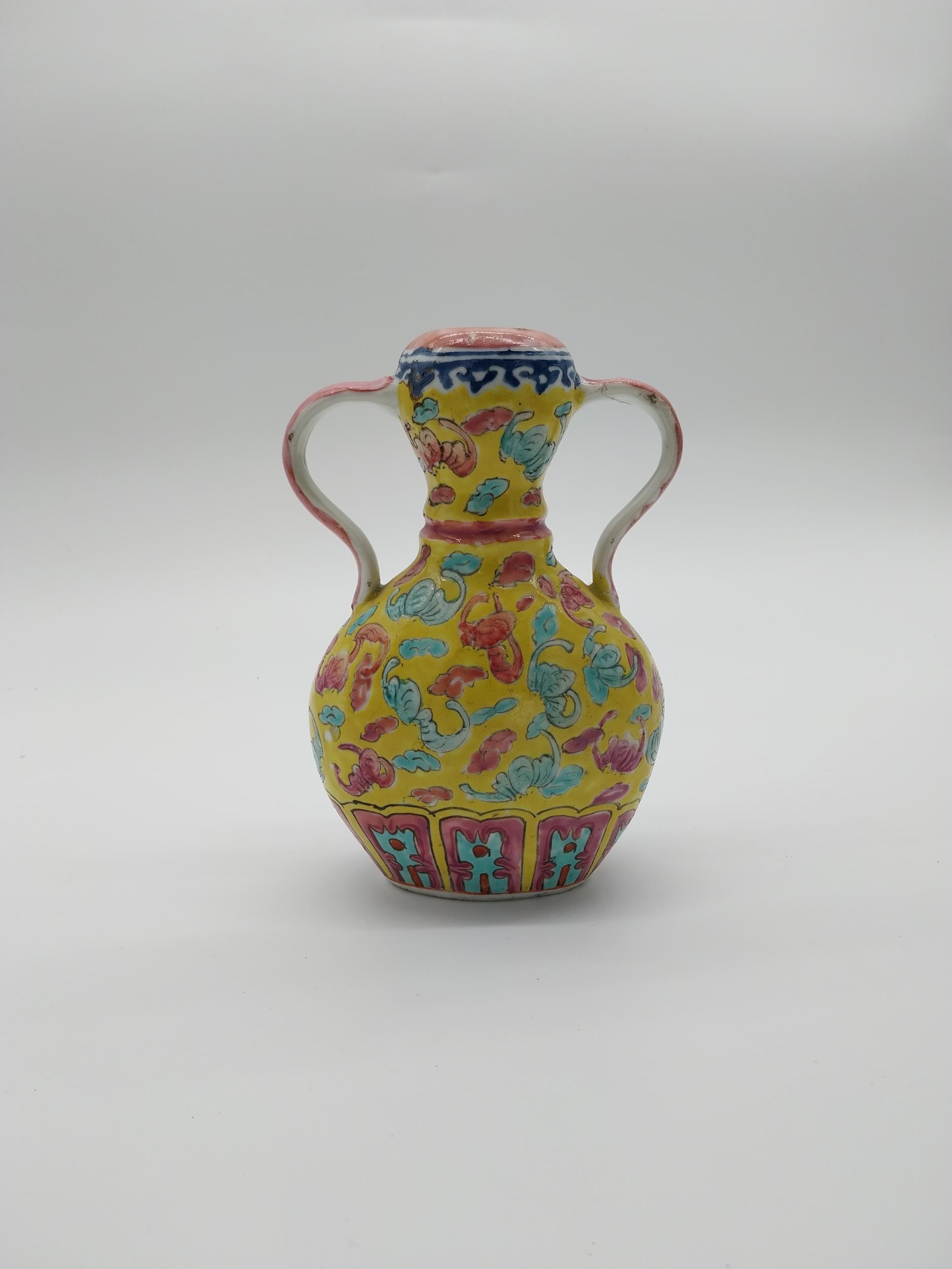 Chinese ceramic two handled vase. {20 cm H x 14 cm W x 8 cm D}.