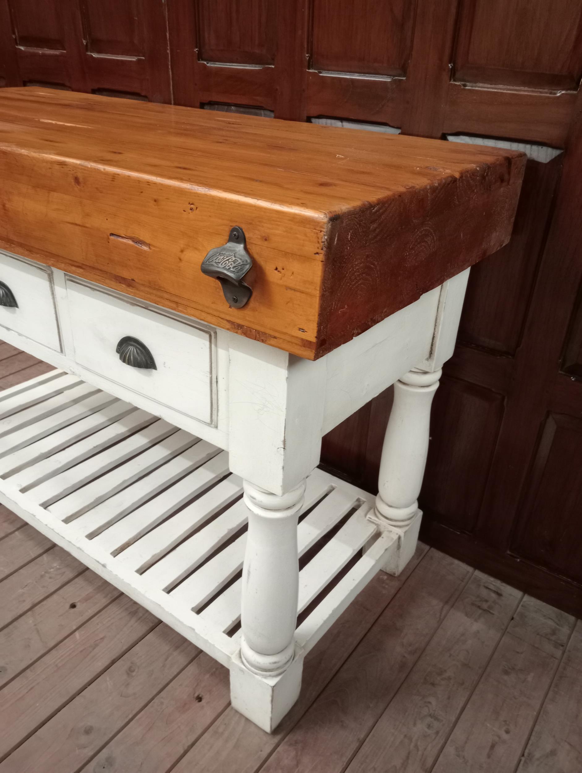 Butchers block with three short drawers raised on turned legs {H 90cm x W 130cm x D 59cm }. - Image 3 of 6