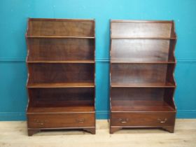 Pair of mahogany open tiered waterfall bookcases with one long drawer in the Georgian style. {158 cm