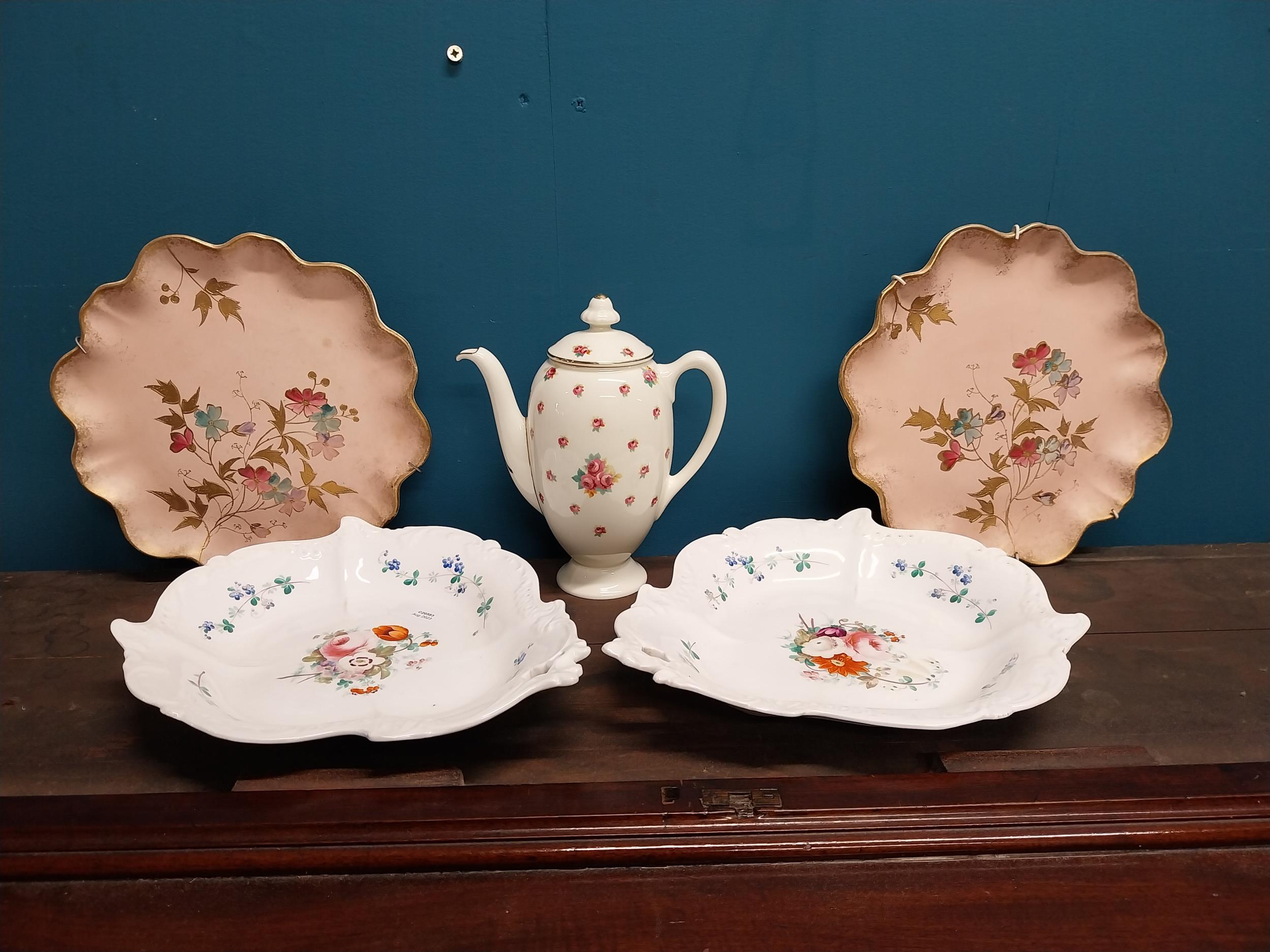 Four early 20th C. hand painted ceramic plates and teapot.