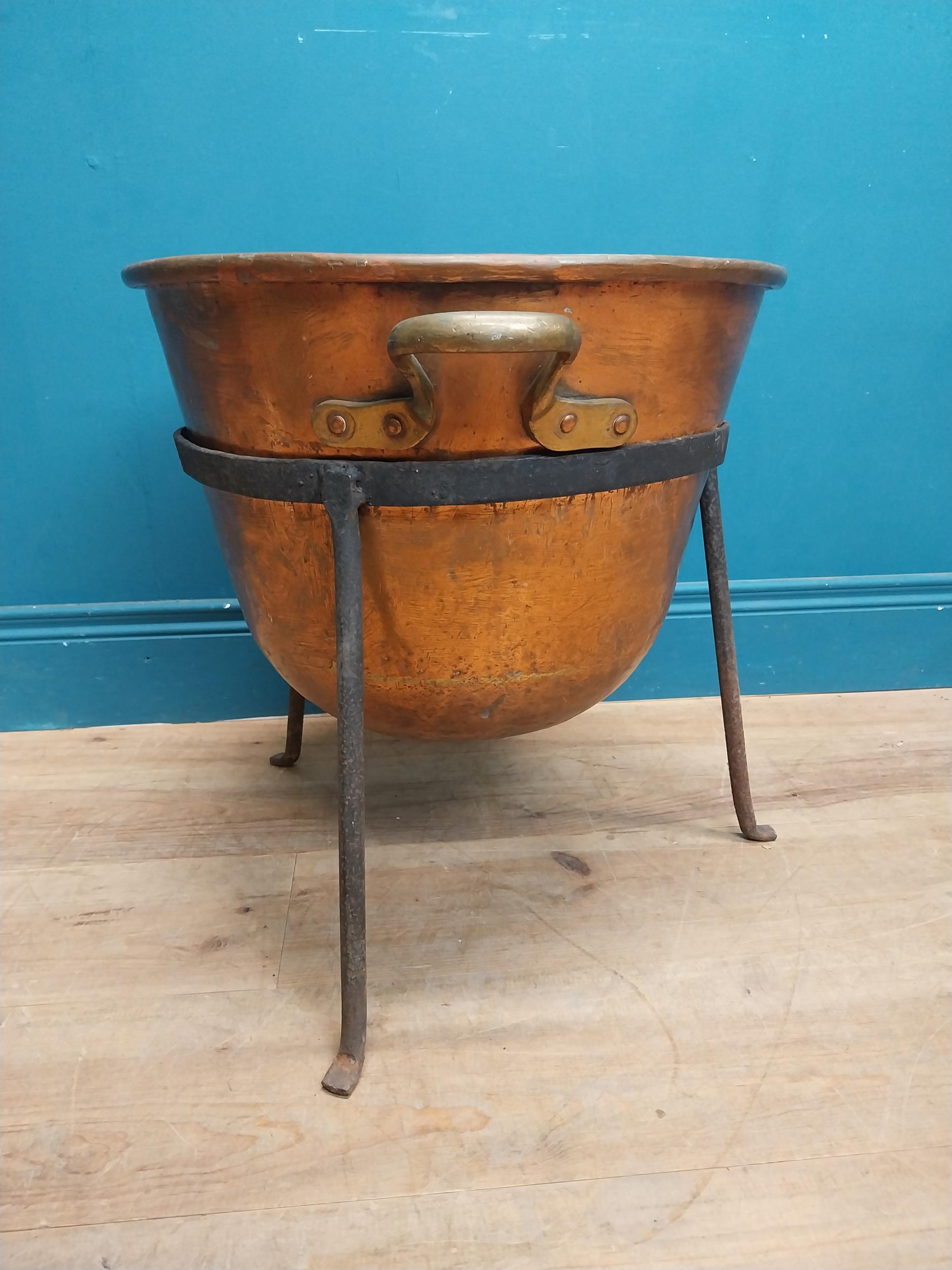 Early 20th C. copper and metal log bucket with two handles on tripod base. {} - Image 3 of 4