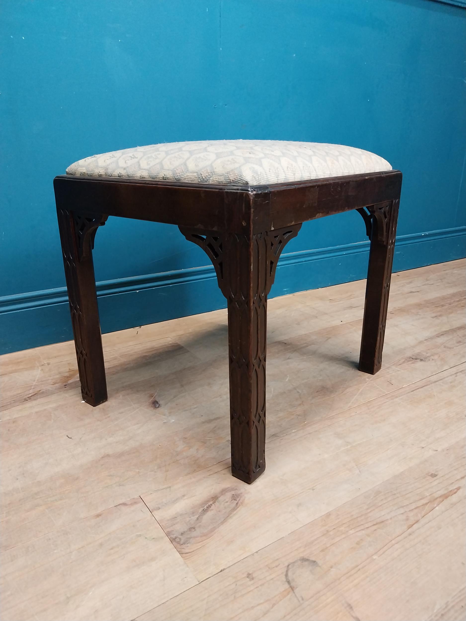 19th C. mahogany and upholstered stool in the Chippendale style. {46 cm H x 54 cm W x 43 cm D}.