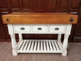 Butchers block with three short drawers raised on turned legs {H 90cm x W 130cm x D 59cm }.