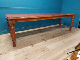 Country pine kitchen table raised on turned legs {80 cm H x 217 cm W x 85 cm D}.