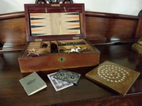 Edwardian mahogany games box {11 cm H x 35 cm W x 20 cm D}.