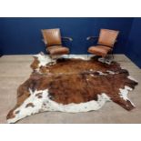 Cowskin rug {W 230cm x D 207cm}.