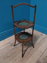 Edwardian mahogany two tiered folding cake stand {60 cm H x 33 cm W x 33 cm D}.