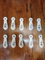 Collection of five pairs of ceramic keyhole covers {H 7cm x W 2cm }.