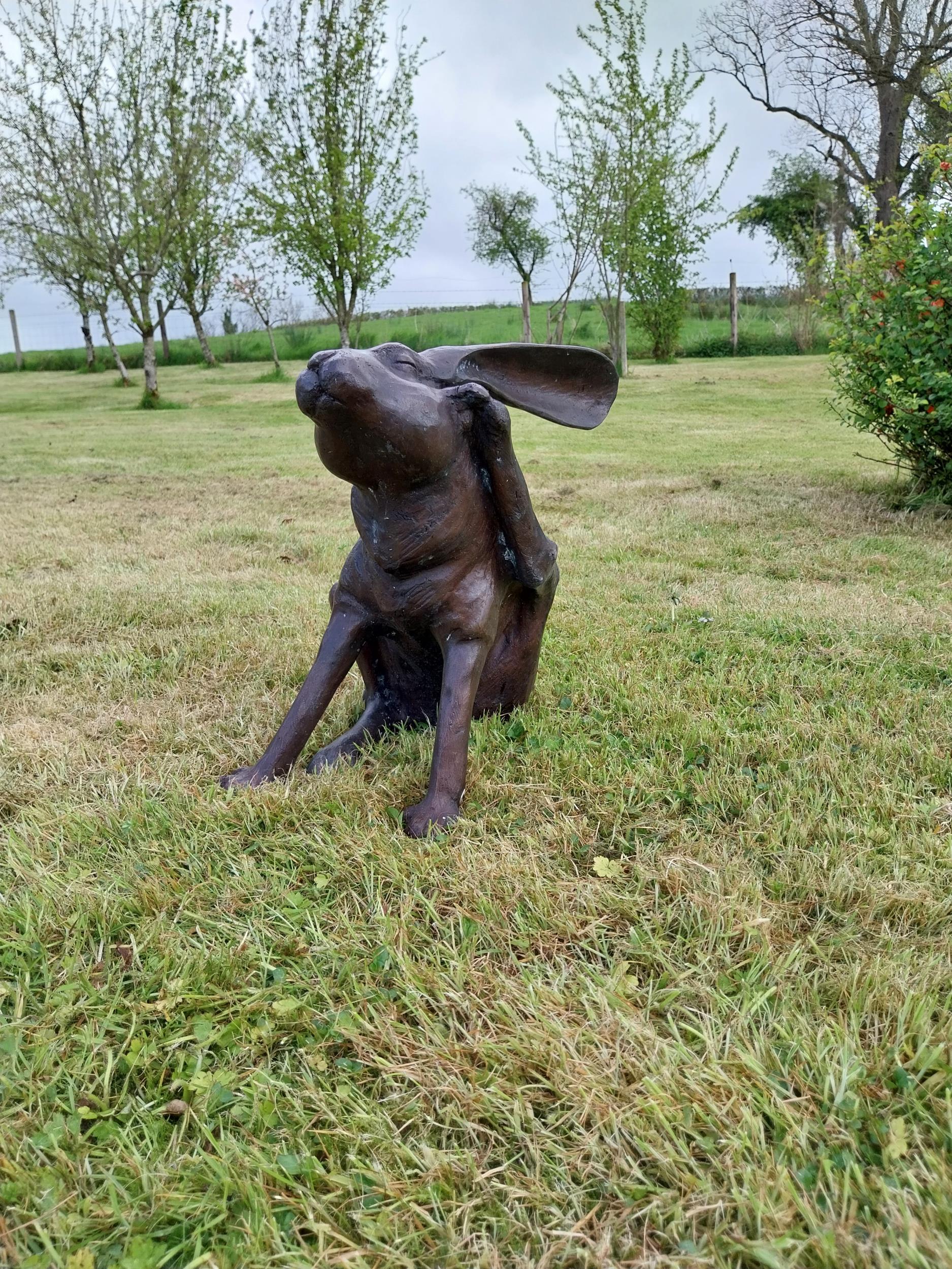 Exceptional quality bronze statue of a seated Hare scratching ear {36 cm H x 38 cm W x 23 cm D}. - Image 2 of 3
