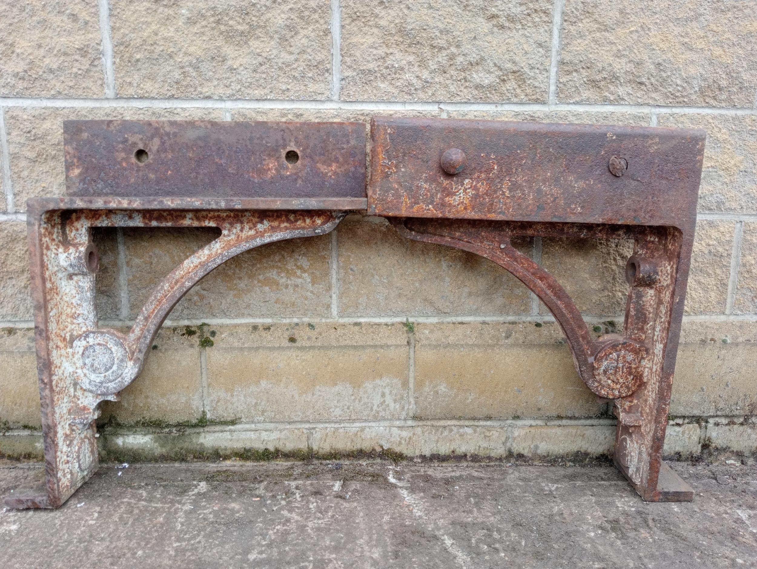 Pair of large heavy cast iron brackets {H 60cm x W 16cm x D 72cm }. (NOT AVAILABLE TO VIEW IN