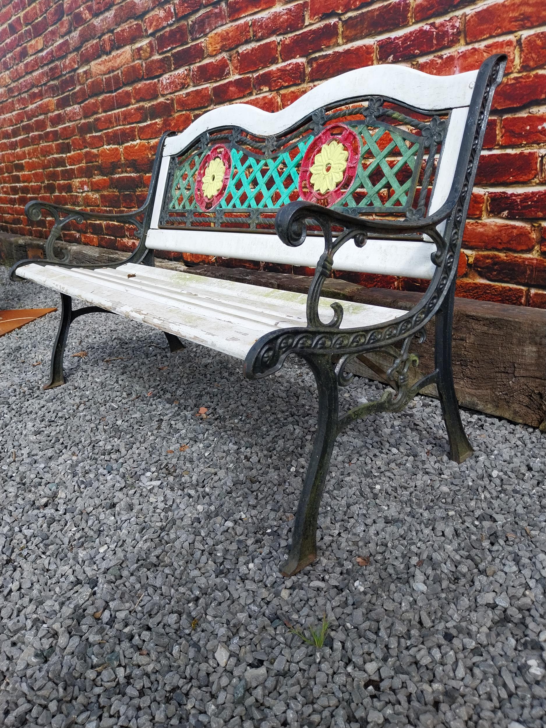 1950s cast iron garden bench with wooden slats decorated with flowers {80 cm H x 128 cm W x 60 cm - Image 3 of 3