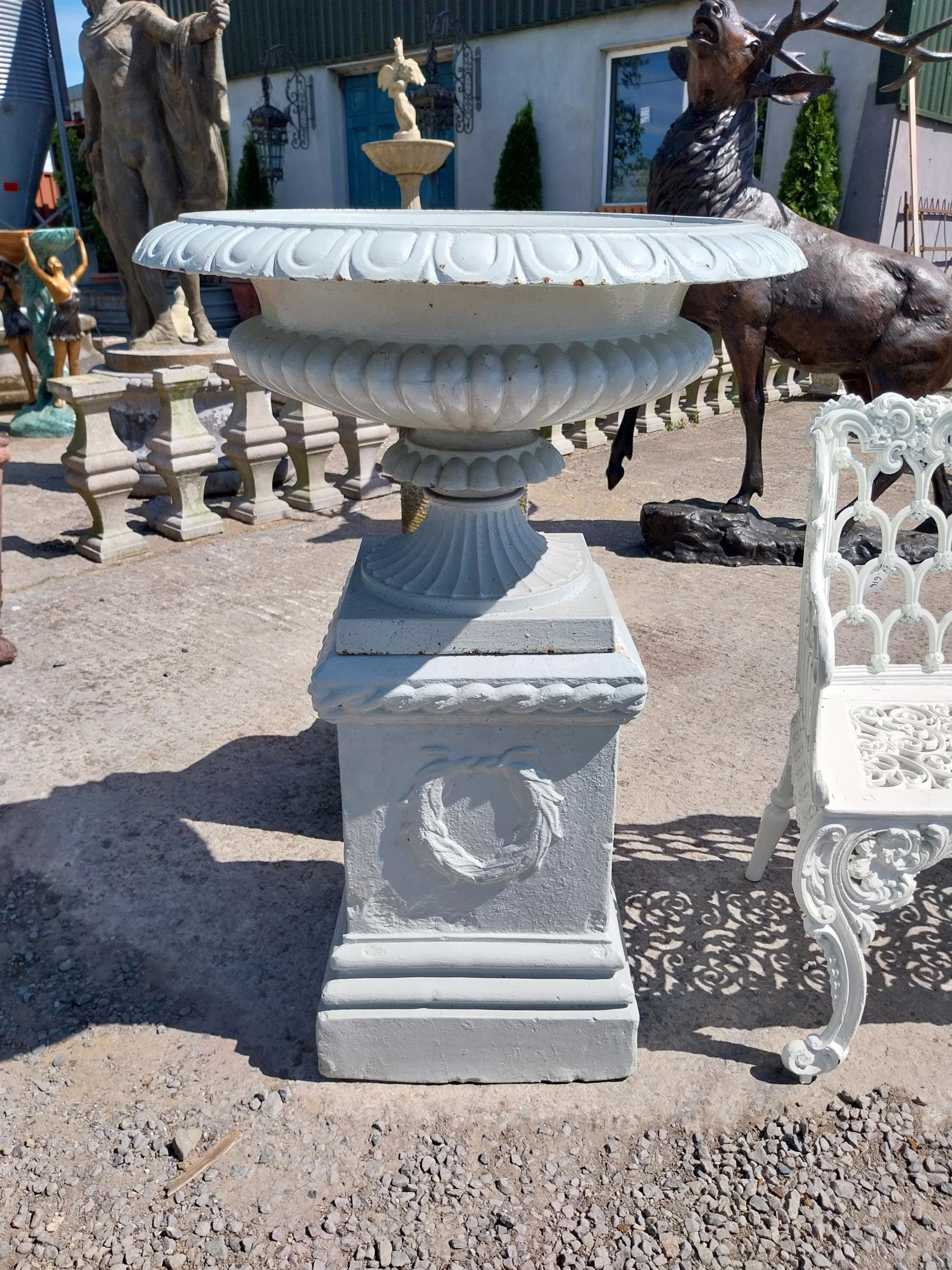 Pair of good quality early 19th C. cast iron urns raised on one buff terracotta pedestal decorated - Image 4 of 5