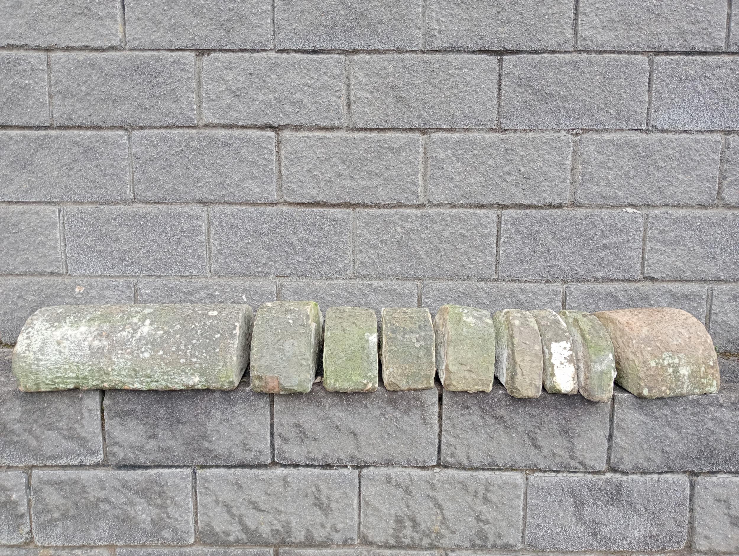 Collection of nine sandstone wall copings bull nose half round {Total length 1.7 metres}. (NOT
