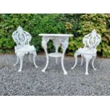 19th C. cast iron garden table with two matching chairs {Tbl. 68 cm H x 59 cm Dia. and Chairs 83