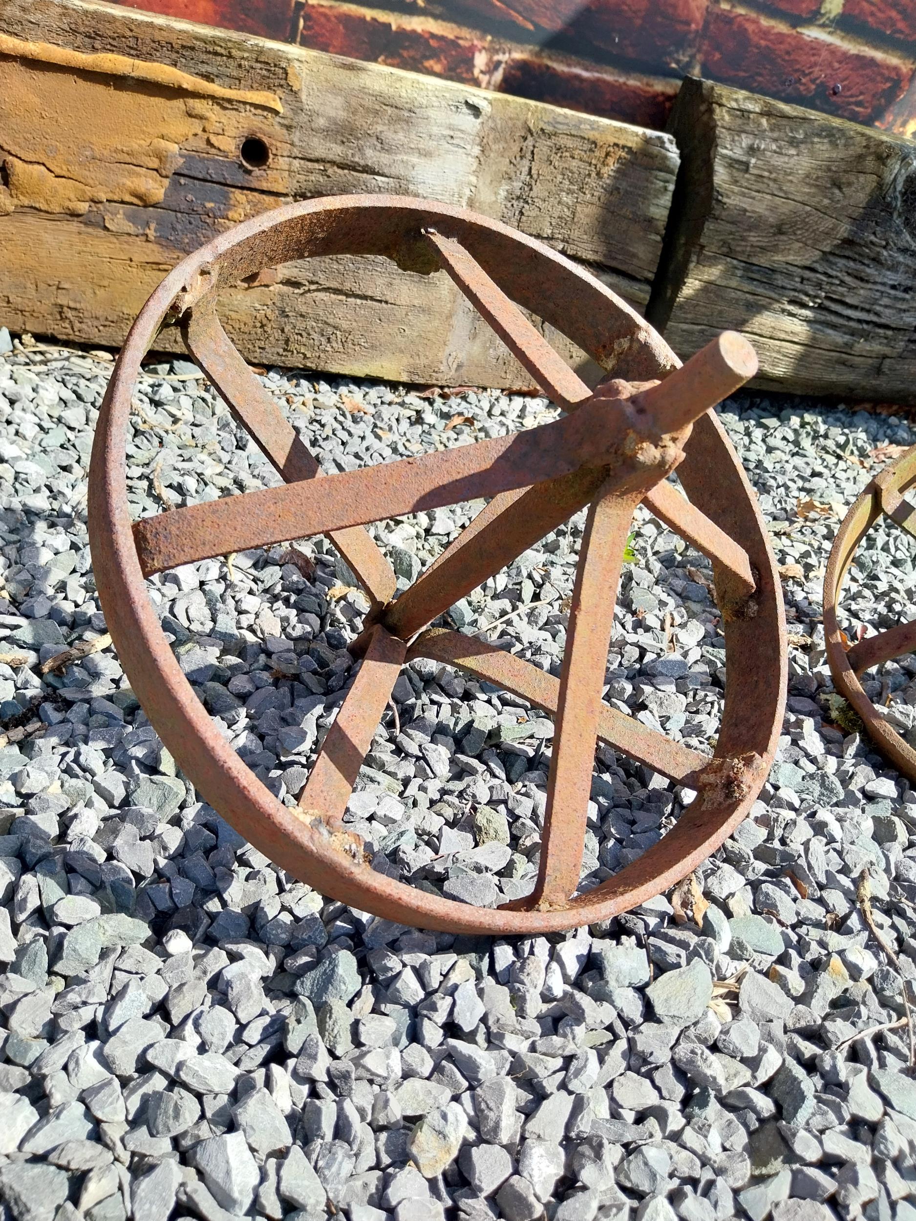 Pair of cast iron wheel barrow wheels {33 cm W x 34 cm Dia.}. - Image 2 of 4