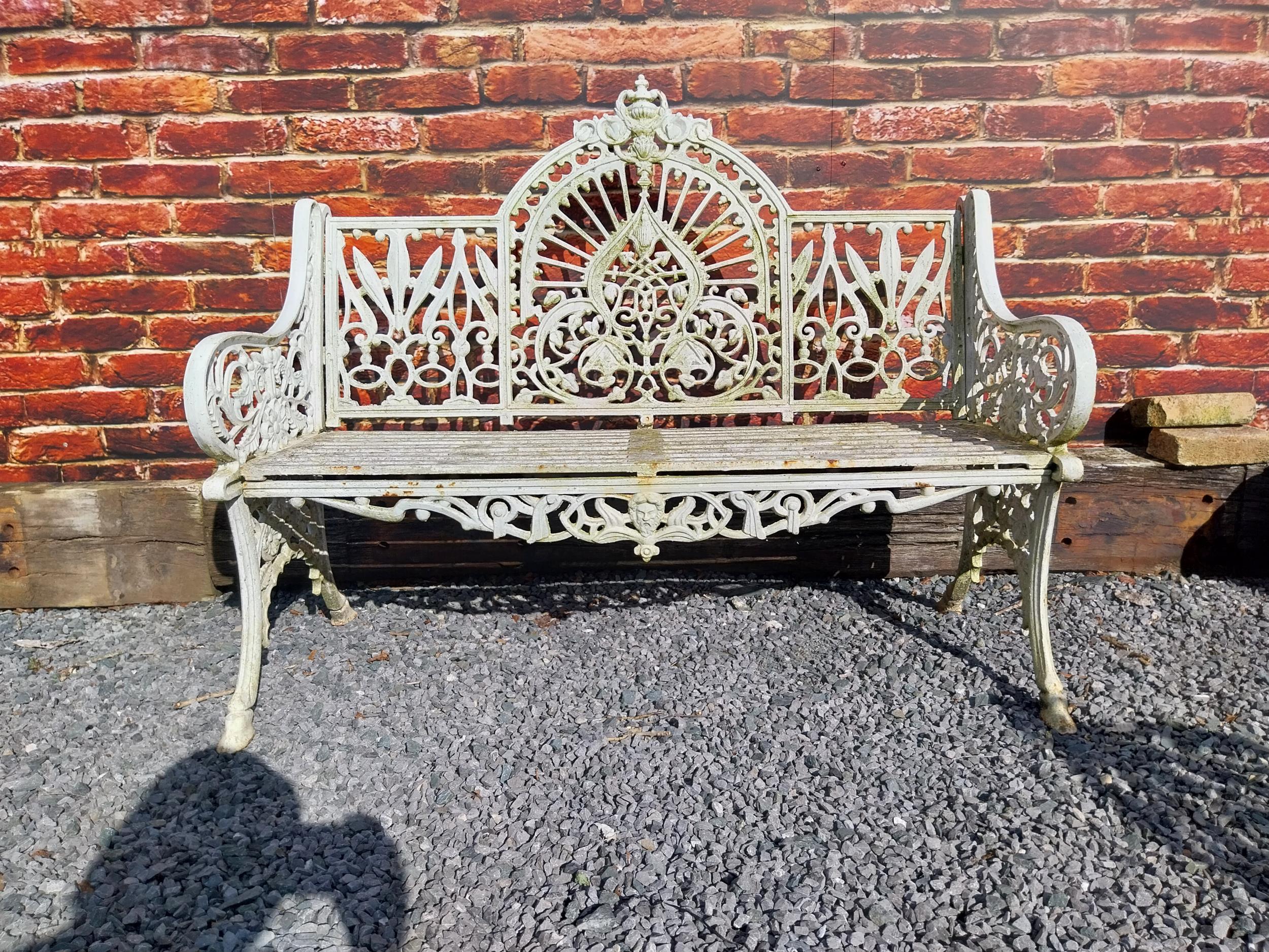 Good quality Pierce Wexford cast iron garden bench {108 cm H x 132 cm W x 65 cm D}.