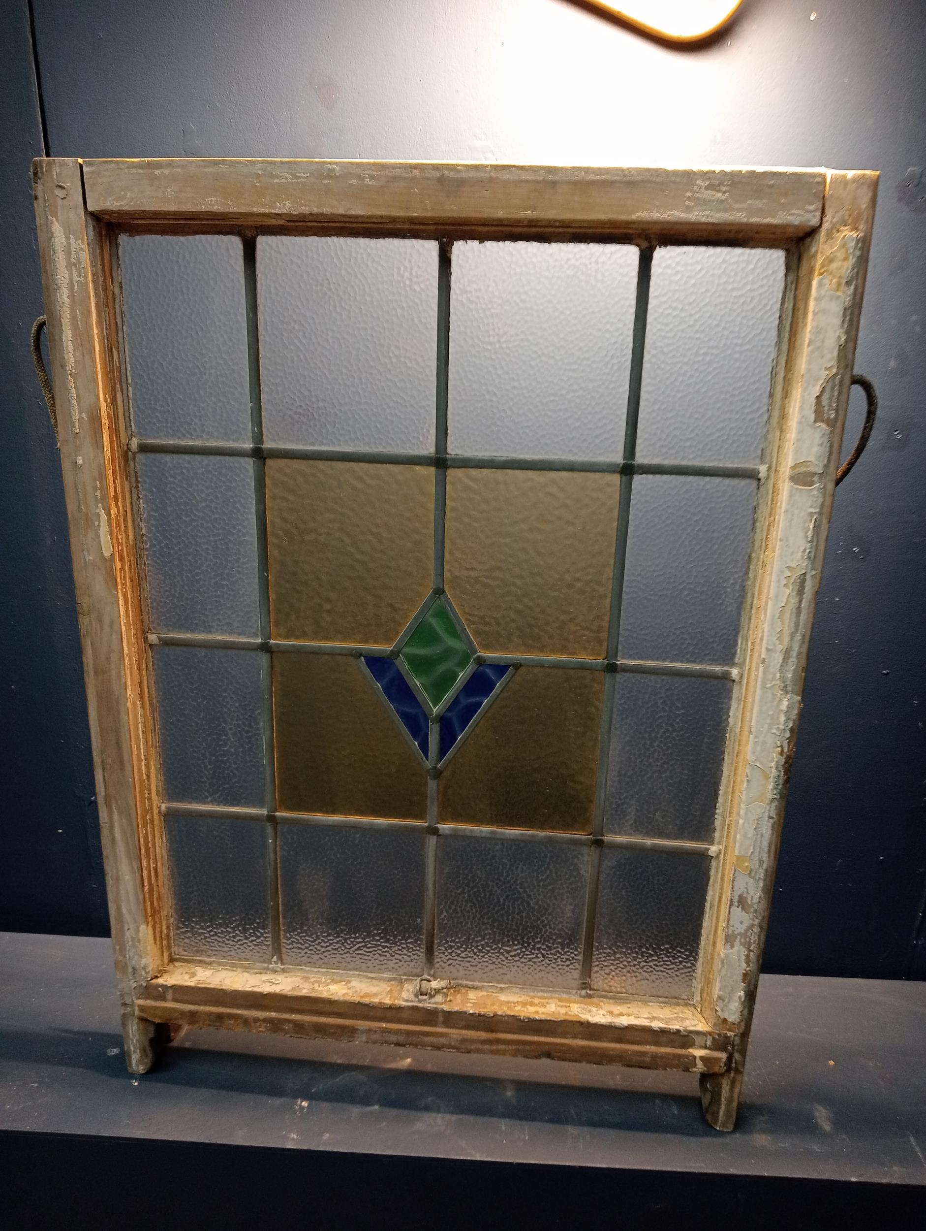 Leaded stain glass window with blue and green centre {H 89cm x W 64cm }. (NOT AVAILABLE TO VIEW IN