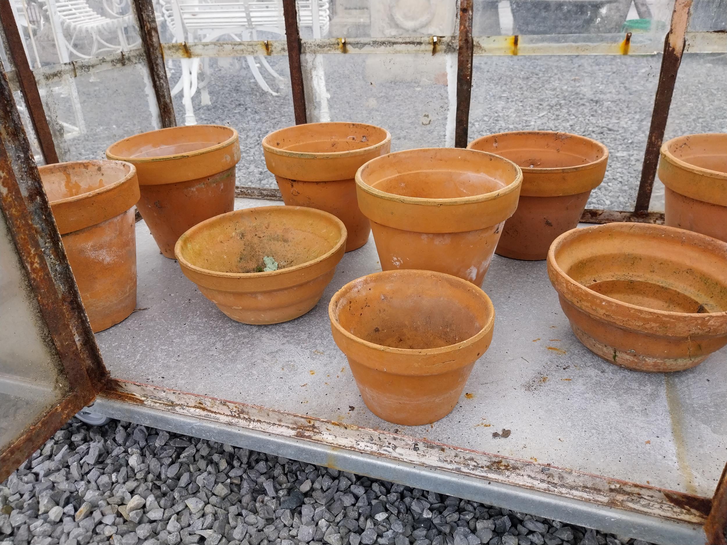 Collection of eighteen 20th C. terracotta plant pots.